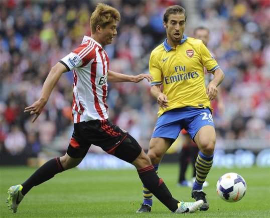 Arsenal midfielder Mathieu Flamini has expressed his joy at making a “seamless” return to the club this summer.