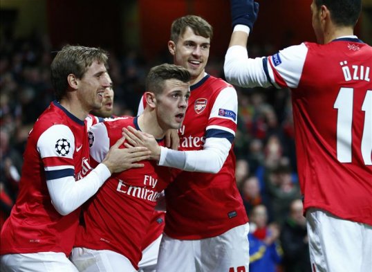 Jack Wilshere scored twice and Mesut Ozil missed a penalty as Arsenal beat Marseille 2-0 at the Emirates Stadium.