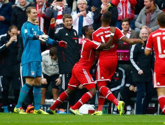 First half goals from Jerome Boateng and Franck Ribery ensured Bayern remain top of the Bundesliga with victory over FC Augsburg.