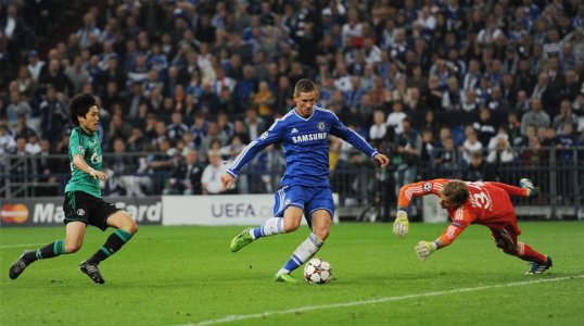 Two goals from a resurgent Fernando Torres and a late finish from Eden Hazard earned Chelsea all three points from their Champions League clash against Schalke 04 in Germany.