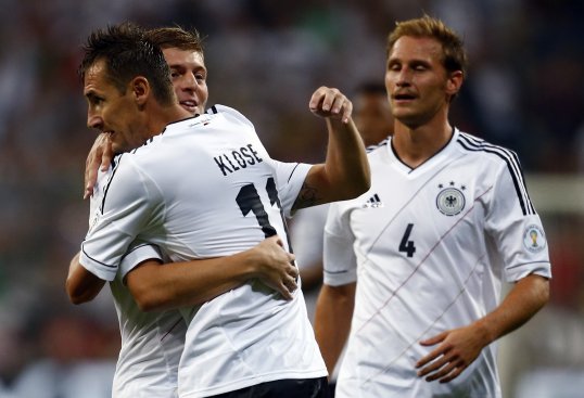 Goals from Miroslav Klose, Toni Kroos and Thomas Muller gave Germany a comfortable victory over Austria in a World Cup qualifier on Friday evening.