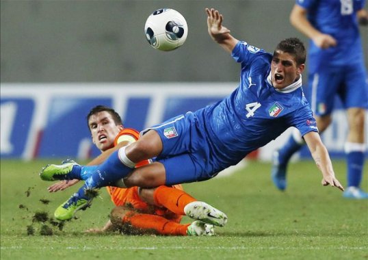 Italy Under-21s have reached the final of the European Championships in Israel after a fiery 1-0 victory over Netherlands Under-21s.