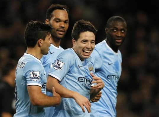 Manchester City have continued their 100 per cent home record in the Premier League this season with a victory over Swansea City at the Etihad Stadium.