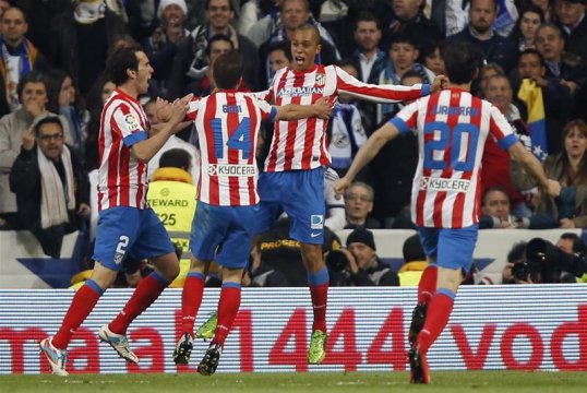 Atletico Madrid beat Real Madrid 2-1 in extra-time to win the Copa del Rey for the first time in 17 years on Friday night.