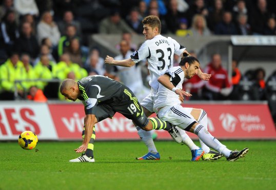 Charlie Adam rescued a point for Stoke City with a late penalty against Swansea City at the Liberty Stadium on Sunday afternoon.