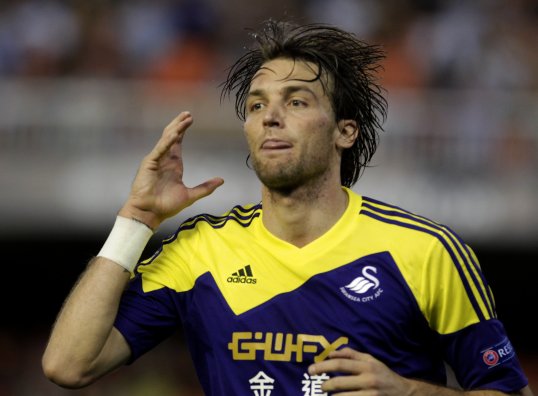 A dominant Swansea City side stunned 10-man Valencia at the Mestalla in the Europa League on Thursday.