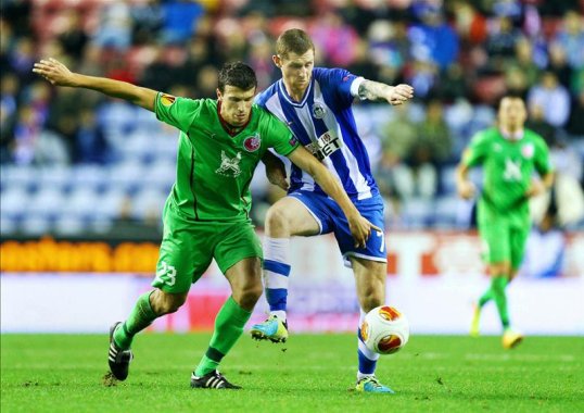 Wigan Athletic maintained their unbeaten record in their first ever European campaign after drawing with Rubin Kazan at the DW Stadium.