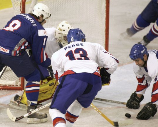 The Great Britain ice hockey team’s hopes of reaching their first Winter Olympics since 1948 were dealt a blow by a ruthless Latvian team in Riga.