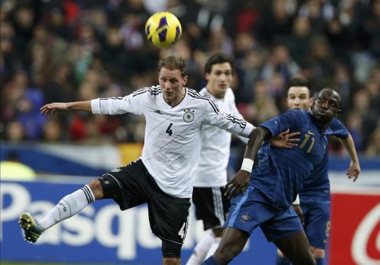 Germany came from a goal down to beat France 2-1 in an international friendly between these two old rivals at the Stade de France.