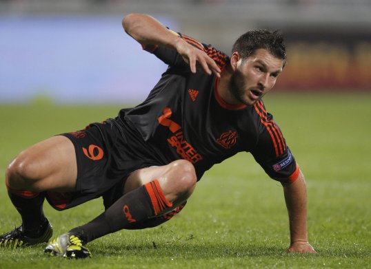 Olympique Marseille striker André-Pierre Gignac has been ruled out of action for six weeks after he suffered a broken foot against Troyes on Sunday.