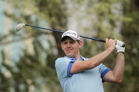 Stephen Gallacher holed a 40-yard bunker shot on the final hole on his way to a third-round 62 at the Dubai Desert Classic.