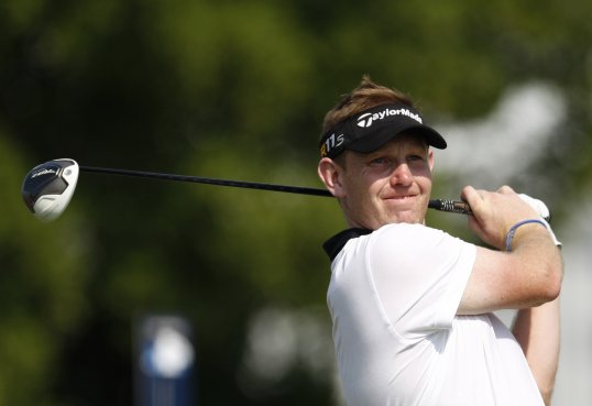 Scotland's Stephen Gallacher won his second European Tour title with a three-shot victory at the Dubai Desert Classic.