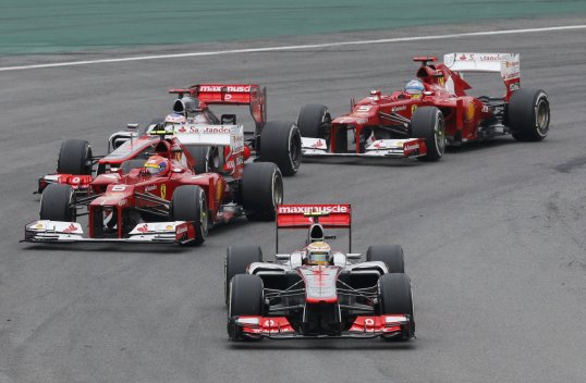 Lewis Hamilton has crashed out of his last Grand Prix for McLaren in Brazil.