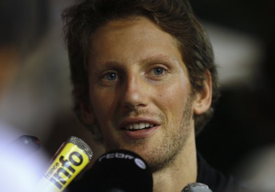 Formula 1 driver Romain Grosjean has managed to retain his seat at Lotus for 2013 after speculation that he might be ousted by the team.