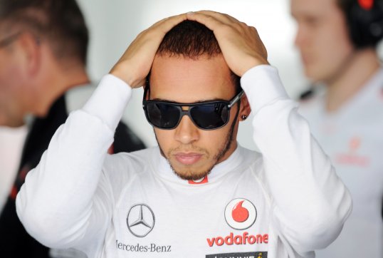 McLaren’s Lewis Hamilton has admitted his hopes of winning a second world title are over for this season.