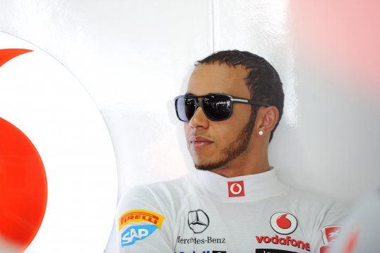 Lewis Hamilton ends his McLaren career with pole position at the Brazilian Grand Prix.