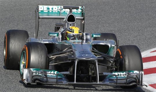 Lewis Hamilton set the pace on the last day of testing at Barcelona on Friday in wet conditions.