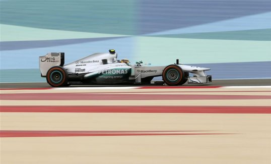 Mercedes’ Lewis Hamilton passes Sergio Perez in the McLaren for fifth with a very late move out from the Mexican’s slipstream and up the inside into Turn 1.