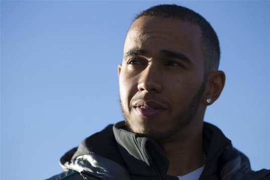 Lewis Hamilton is unhurt after crashing his Mercedes during Formula 1 pre-season tests at Jerez.