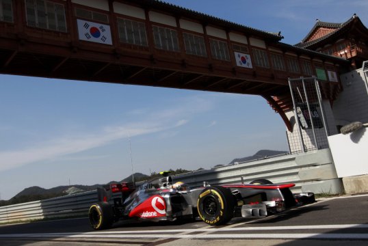 McLaren's Lewis Hamilton has set fastest time in first practice at the Korean Grand Prix.