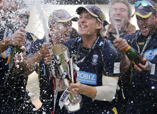 Hampshire has offered contract extensions to four players including captain Jimmy Adams.