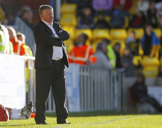 Conference North side Harrogate Town caused an FA Cup upset, beating Torquay 1-0 at Plainmoor.