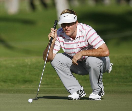 Russell Henley broke the Hawaii Open 36-hole scoring record just two days into his PGA Tour career after firing a second consecutive 63 to take the lead.