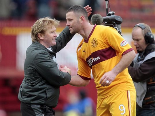 Motherwell striker Michael Higdon has been arrested over an alleged assault after he was crowned Scotland's Player of the Year.