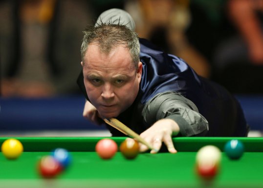 Two-time Masters champion John Higgins beat Ali Carter 6-3 to reach the quarter-finals of the 2013 tournament at Alexander Palace.