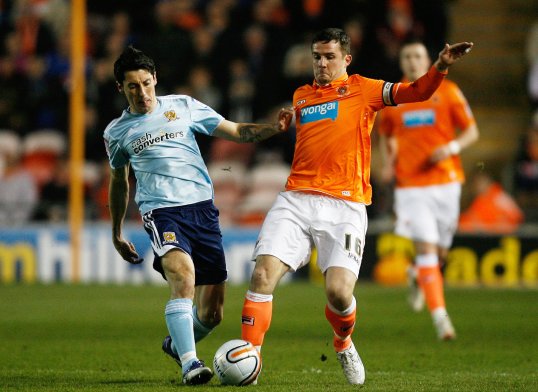 Blackpool boss Ian Holloway has admitted he may put Barry Ferguson on loan so he can find some first-team football.