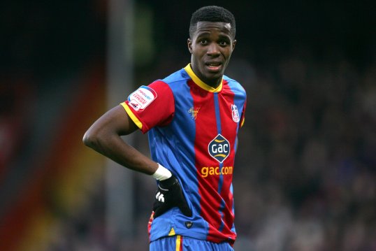 Crystal Palace manager Ian Holloway believes Wilfried Zaha may be distracted by the club’s wish to keep him beyond the next transfer window.