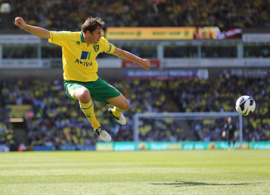 Norwich City striker Grant Holt has hit out at Roy Hodgson's selection policy to play for England.