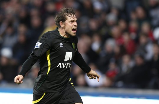Norwich City striker Grant Holt has launched a scathing attack on the England set-up.