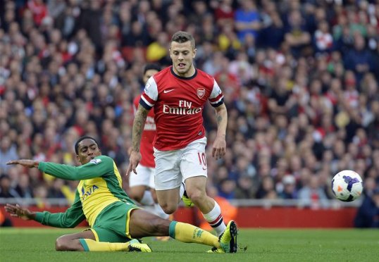 Arsenal lead Norwich City 1-0 at half time at the Emirates Stadium after a superbly worked team goal from the Gunners, finished off by Jack Wilshere.