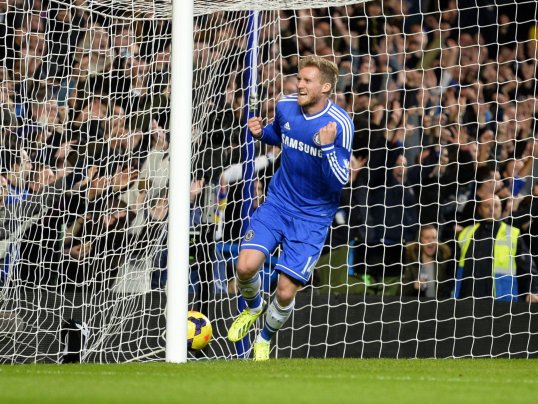 Andre Schurrle gave Chelsea a narrow half-time lead over Manchester City at Stamford Bridge on Sunday evening.