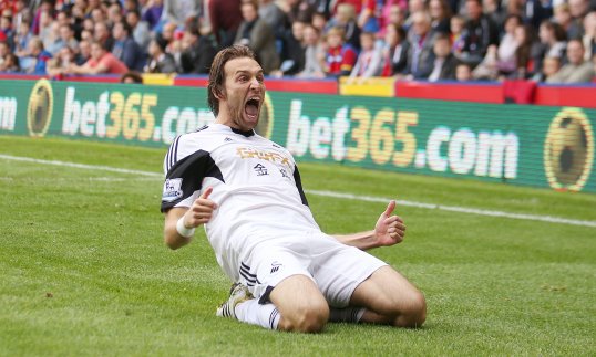 A fine Michu goal gave Swansea City a narrow half-time lead over Crystal Palace at Selhurst Park on Sunday afternoon.