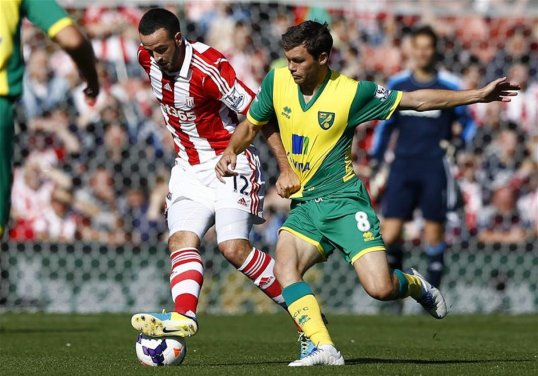 Norwich City deservedly have the lead in the Premier League game at the Britannia Stadium.