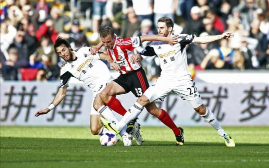 Swansea City and Sunderland played out a scoreless first half at the Liberty Stadium.