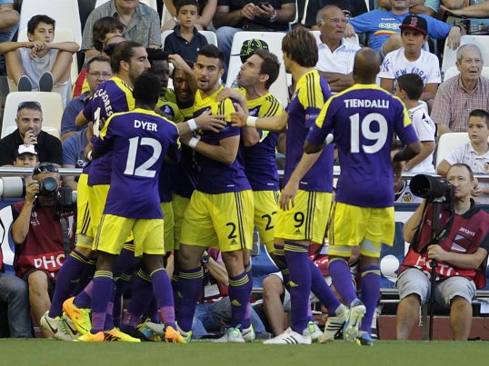 A Wilfried Bony goal gave Swansea City a narrow half-time lead over 10-man Valencia in the Europa League on Thursday.