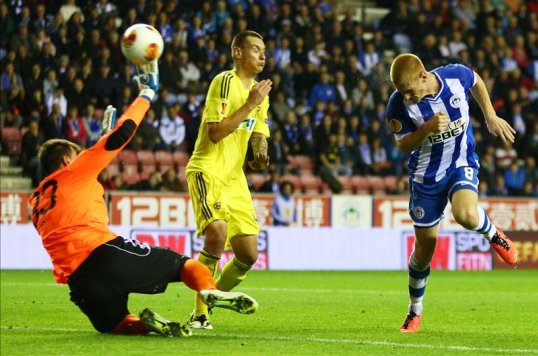 Goals from Nick Powell and Ben Watson have sent Wigan in at half-time with a comfortable lead over NK Maribor.