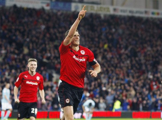 Cardiff City captain Mark Hudson may need surgery on his injured ankle and looks set to be out of action for three to four weeks.