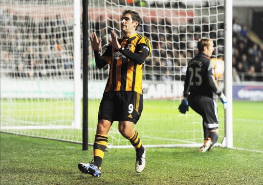 Hull City striker Danny Graham said his side were happy with a draw after his finish earned his men a point against Swansea City at the Liberty Stadium on Monday.