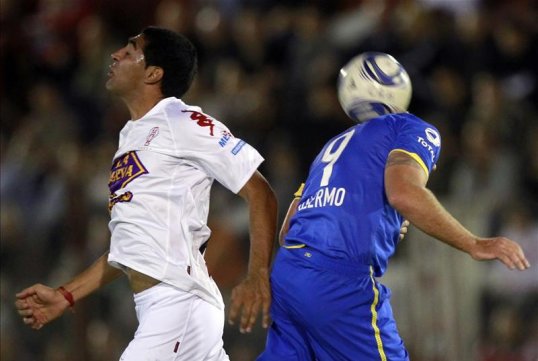 Argentine football fans have stormed their club’s changing room and attacked players after a training session.