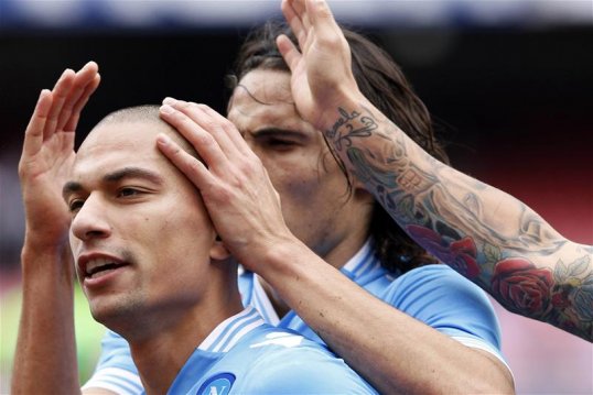 Napoli midfielder Gokhan Inler will be at the club next season, according to his agent.
