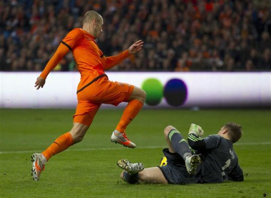 Netherlands manager Louis van Gaal has assured Bayern Munich winger Arjen Robben he is guaranteed a place in the squad for the 2014 World Cup.