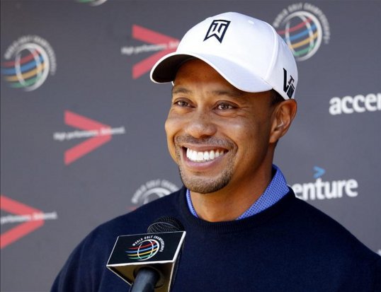 Tiger Woods has described playing a round of golf with US President Barack Obama as “pretty cool”.