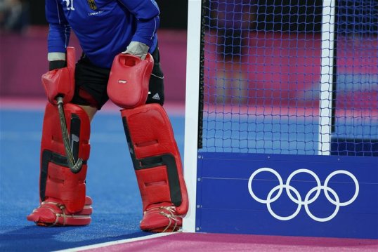 England Hockey chief executive Sally Munday has criticised the International Olympic Committee about its deliberation over whether to drop the sport from the 2020 Games.