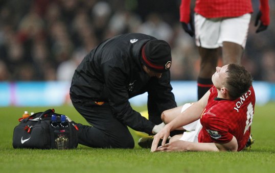Manchester United defender Phil Jones faces a spell on the side-lines after suffering an ankle injury during Monday's 2-1 FA Cup win over Reading.