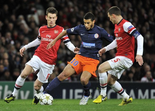 Arsenal may have had the better chance so far in the Group B Champions League game but it was finely balanced in the first half.