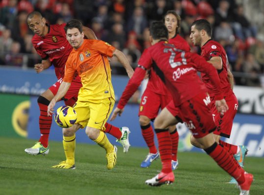 Two goals in the final minute gave Barcelona a deserved lead as they dominate play in their La Liga clash with Mallorca.